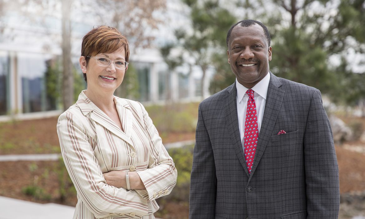 Dawn Abel, director of community relations and foundations, and Calvin Anderson, senior vice president and chief of staff, at the BlueCross headquarters