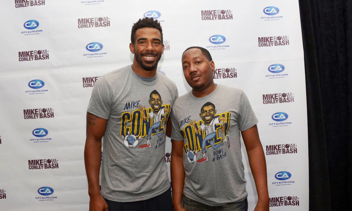 Memphis Grizzlies point guard Mike Conley and Mark Yancy, director of the center.