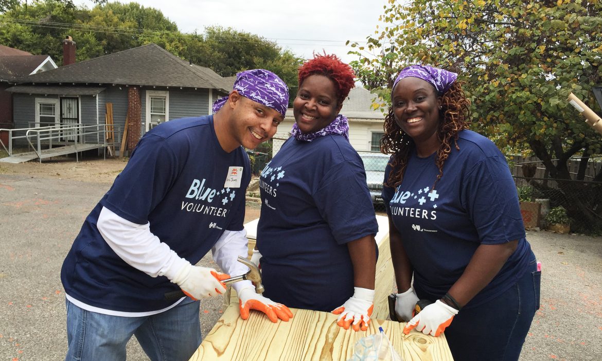 Bluecross volunteers help build a playground in Memphis