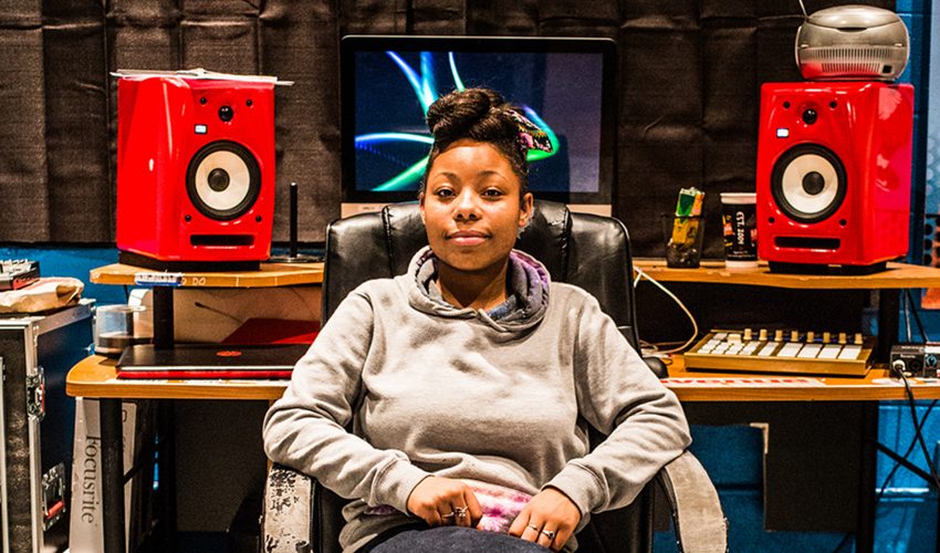 young girl in front of recording equipment at rocketown